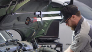 BMW iDrive warning light display showing check engine fault code at The HAUS Auto Culver City specialist